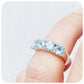 Round cut Sky Blue Topaz half eternity November birthstone ring - Victoria's Jewellery