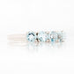 Annie, a Sky Blue Topaz Half Eternity Ring