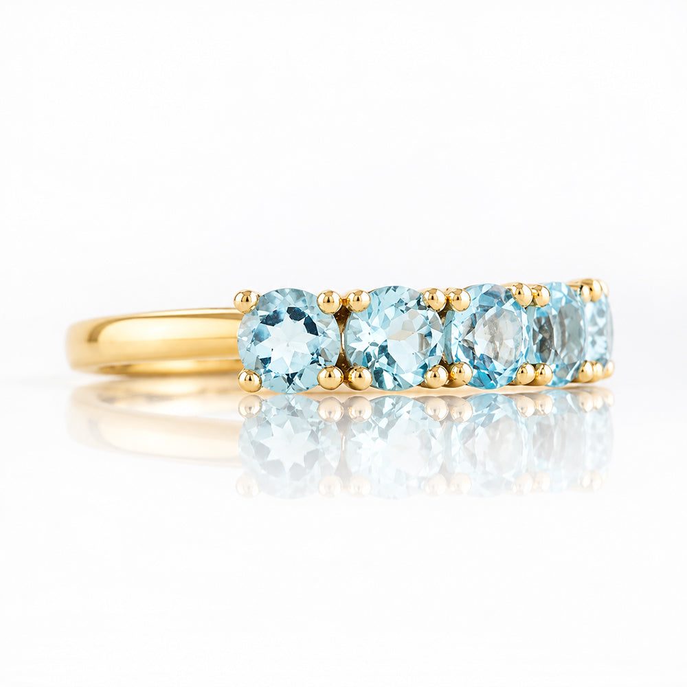 Annie, a Sky Blue Topaz Half Eternity Ring - Victoria's Jewellery