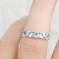 Annie, a Sky Blue Topaz Half Eternity Ring