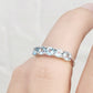 Annie, a Sky Blue Topaz Half Eternity Ring