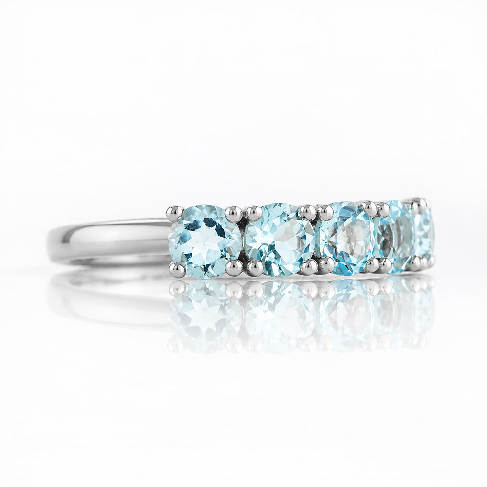 Annie, a Sky Blue Topaz Half Eternity Ring - Victoria's Jewellery