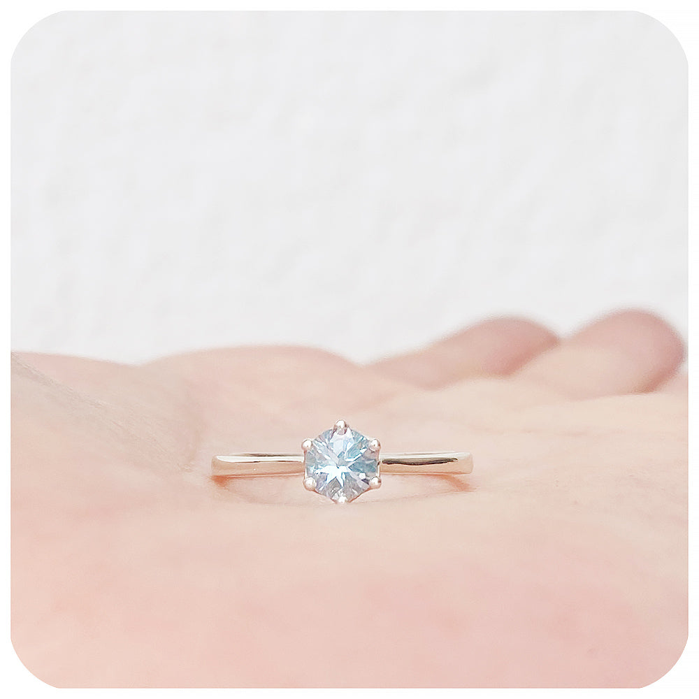 Tulip, a Six Claw Sky Blue Topaz Ring