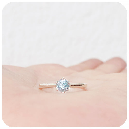 Tulip, a Six Claw Sky Blue Topaz Ring