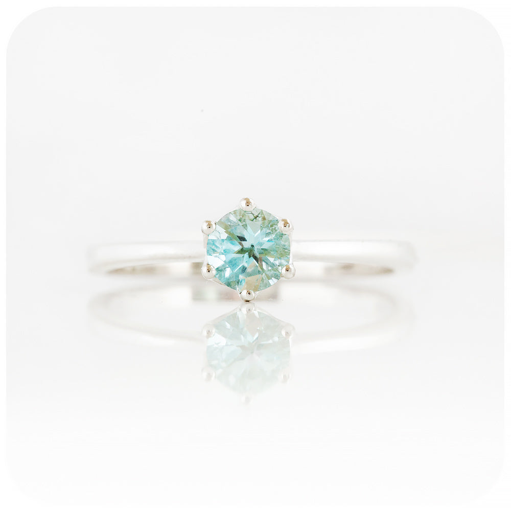 Tulip, a Six Claw Sky Blue Topaz Ring