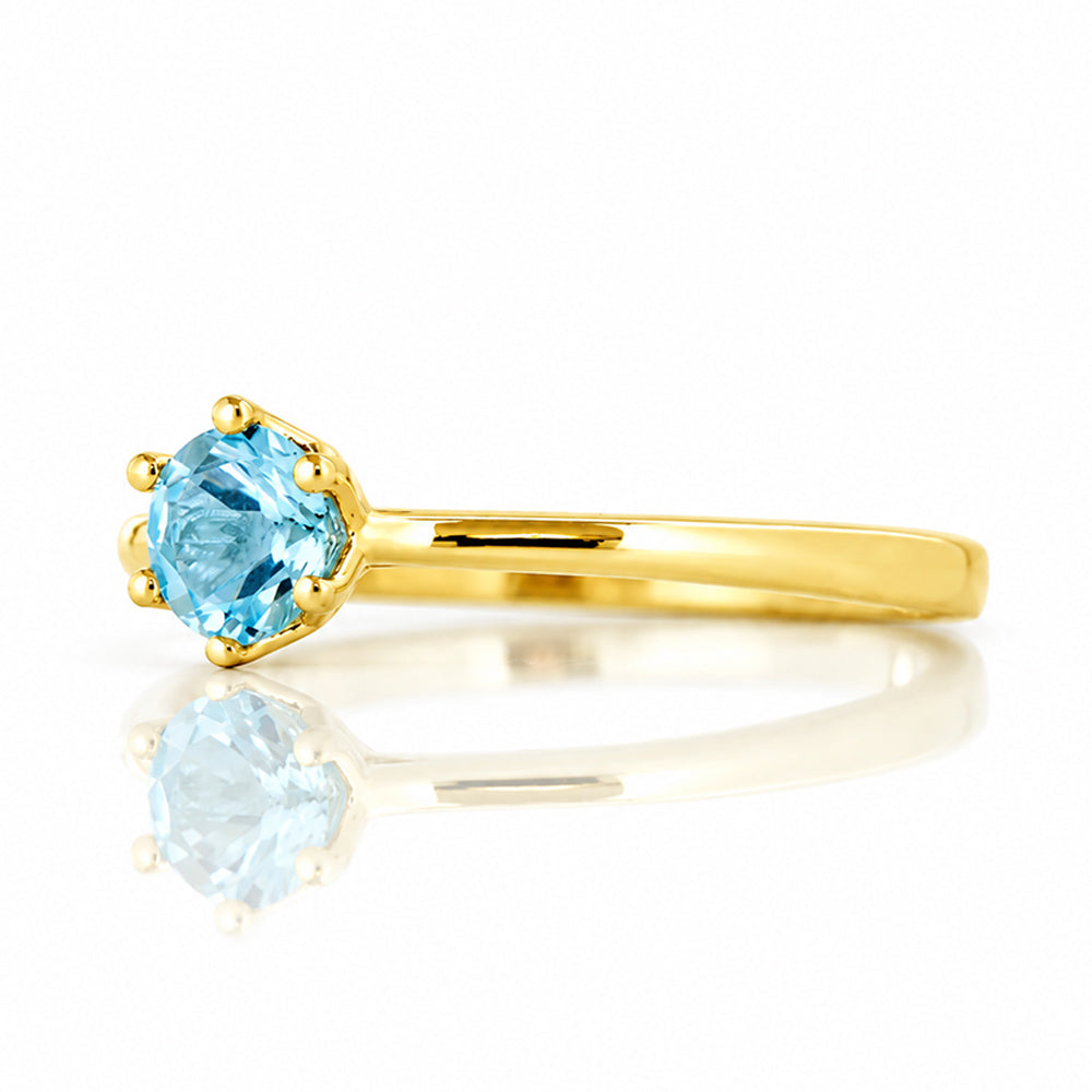 Tulip, a Six Claw Sky Blue Topaz Ring - Victoria's Jewellery
