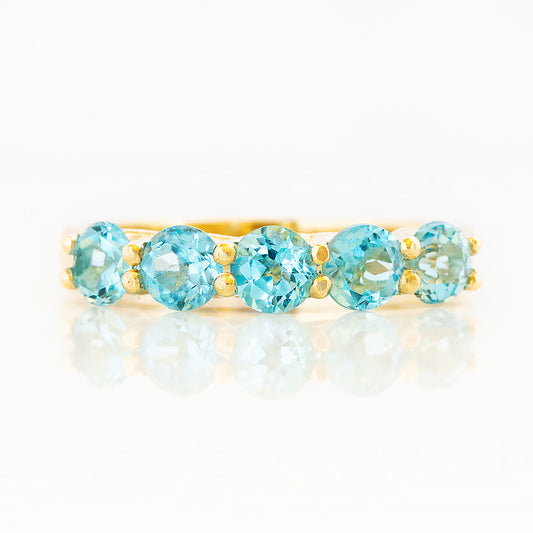 Danelle, a Swiss Blue Topaz Half Eternity Trellis Ring