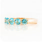 Danelle, a Swiss Blue Topaz Half Eternity Trellis Ring