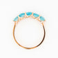 Danelle, a Swiss Blue Topaz Half Eternity Trellis Ring