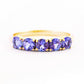 Round cut Tanzanite half eternity December Anniversary Ring in Yellow Gold - Victoria's Jewellery
