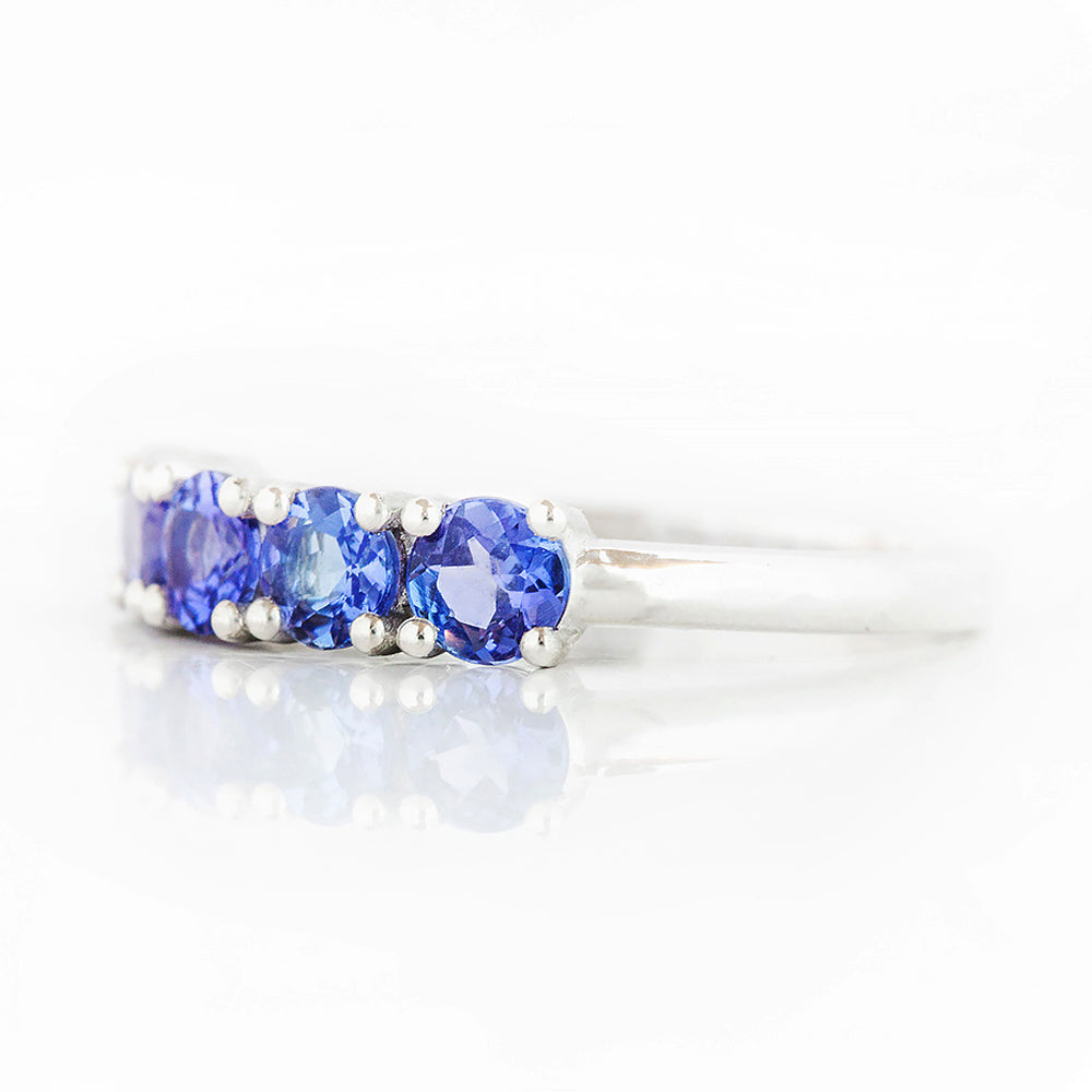 Round cut Tanzanite half eternity December Anniversary Ring in White Gold - Victoria's Jewellery