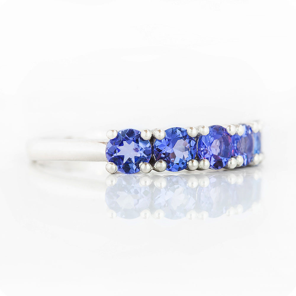 Round cut Tanzanite half eternity December Anniversary Ring in White Gold - Victoria's Jewellery