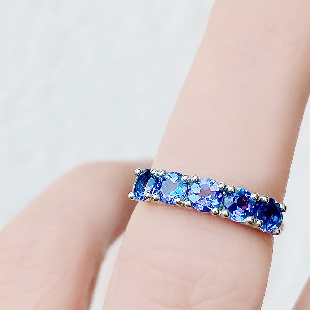 Round cut Tanzanite half eternity December Anniversary Ring in White Gold - Victoria's Jewellery