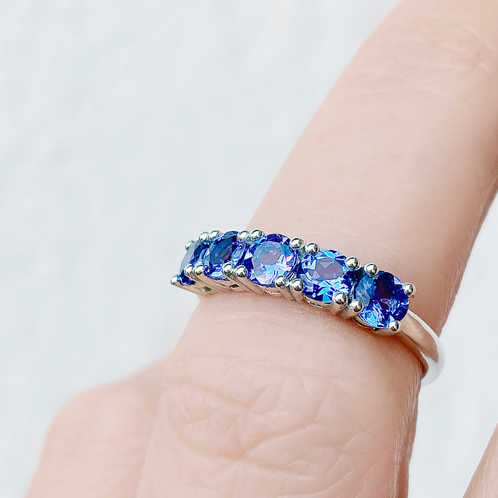 Round cut Tanzanite half eternity December Anniversary Ring in White Gold - Victoria's Jewellery