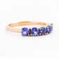 Round cut Tanzanite half eternity December Anniversary Ring in Rose Gold - Victoria's Jewellery