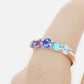 Danelle, a Blue Half Eternity Trellis Ring