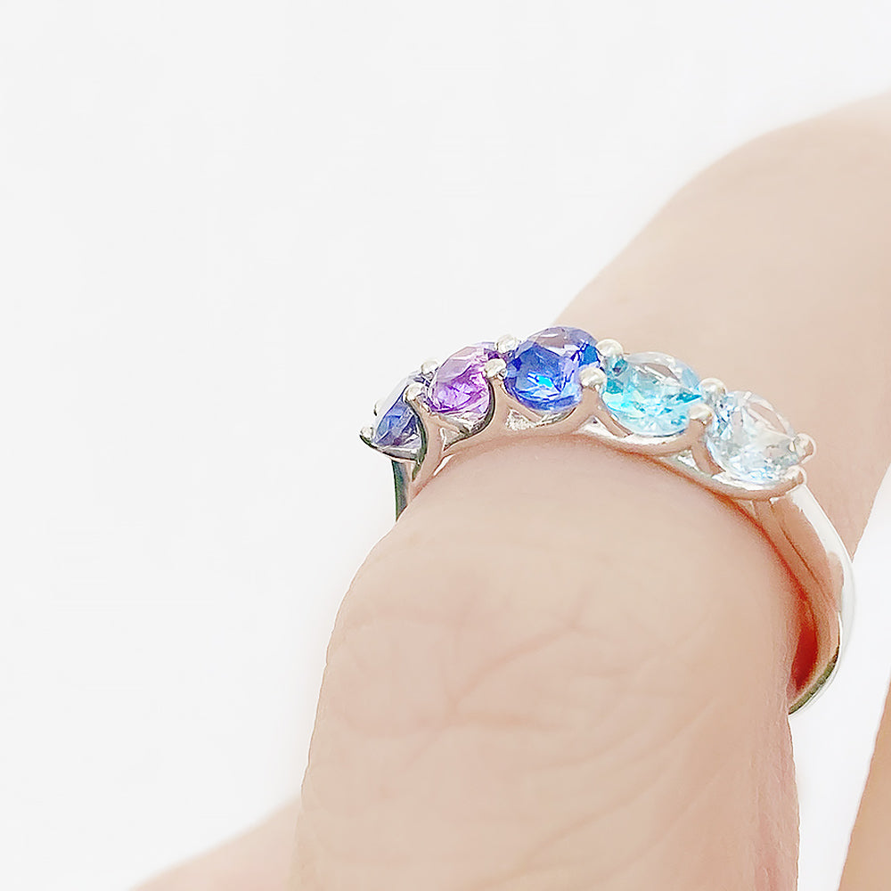 Danelle, a Blue Half Eternity Trellis Ring