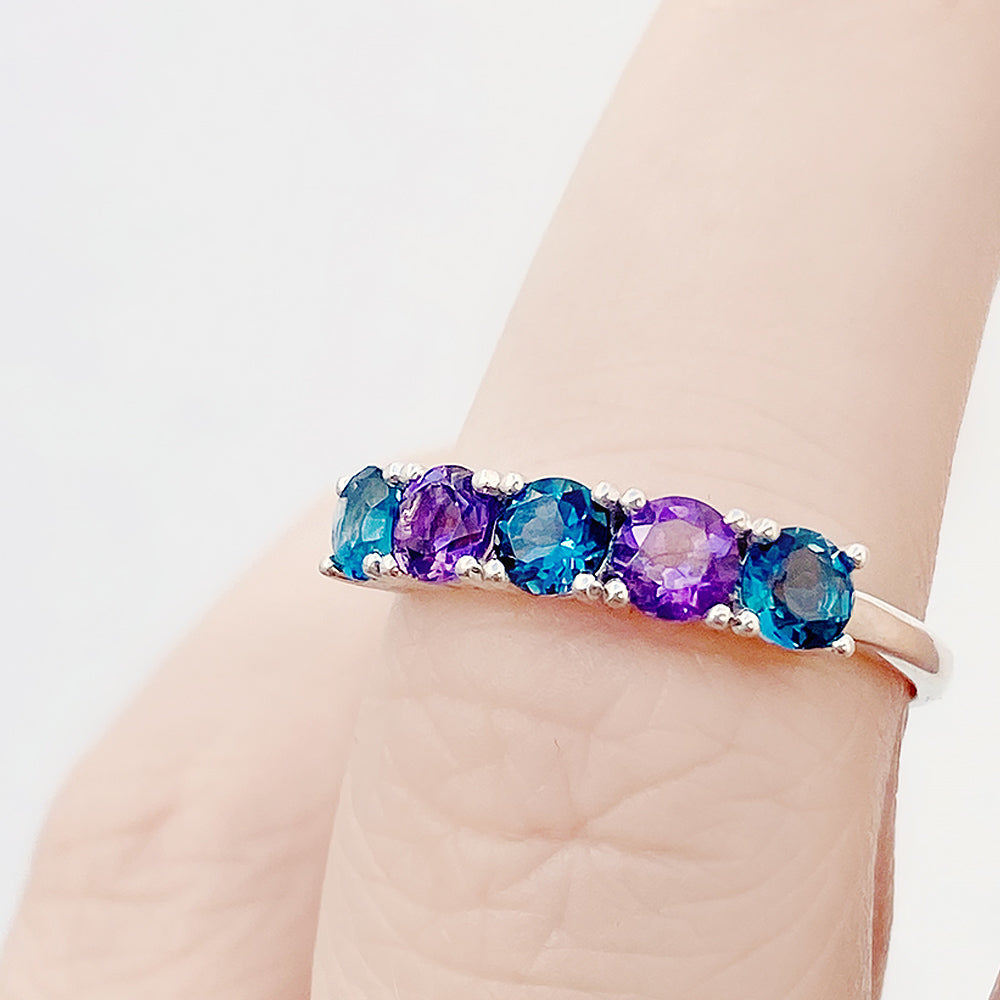 Annie, a London Topaz and Amethyst Half Eternity Ring