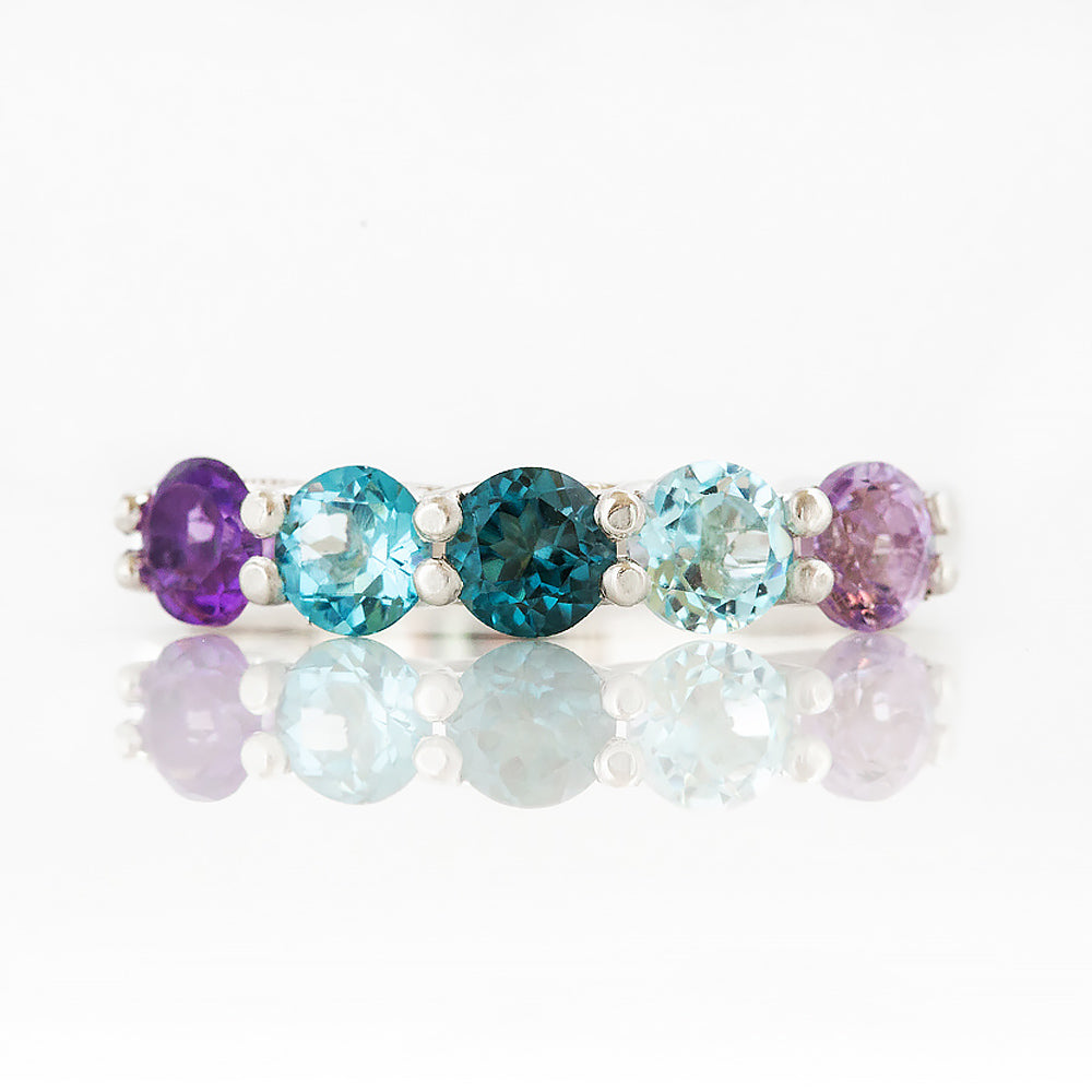 Danelle, a Topaz and Amethyst Rainbow Half Eternity Trellis Ring