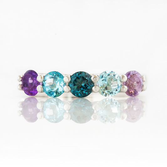Danelle, a Topaz and Amethyst Rainbow Half Eternity Trellis Ring