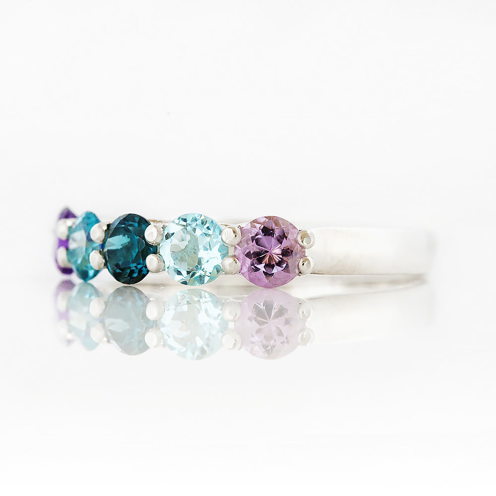 Danelle, a Topaz and Amethyst Rainbow Half Eternity Trellis Ring