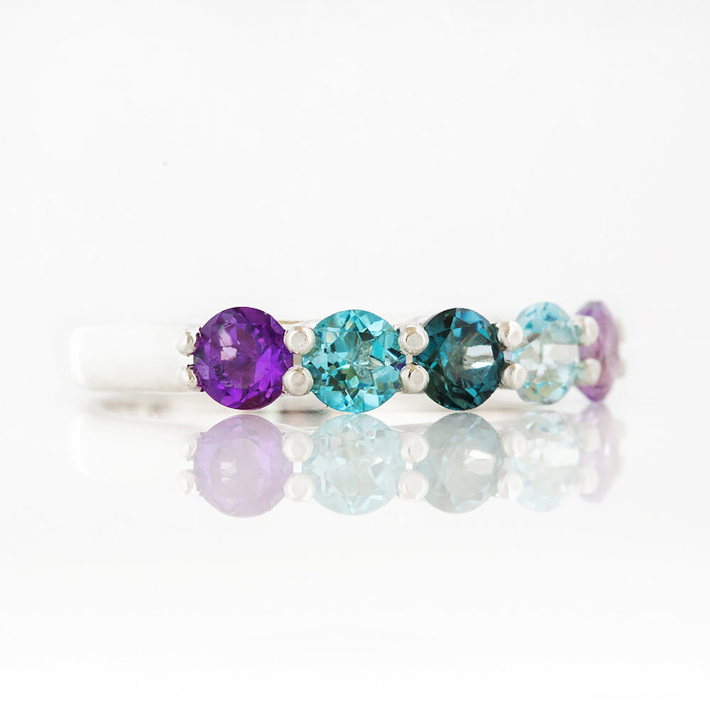 Danelle, a Topaz and Amethyst Rainbow Half Eternity Trellis Ring