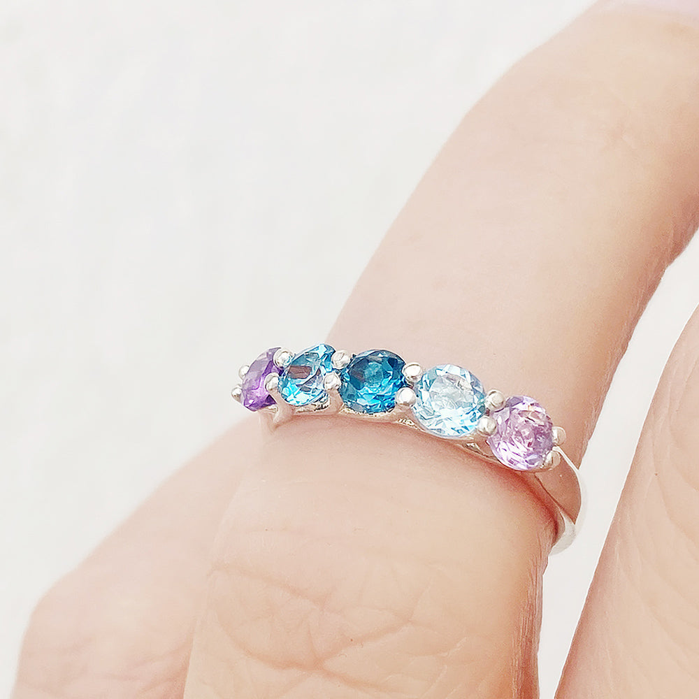 Danelle, a Topaz and Amethyst Rainbow Half Eternity Trellis Ring