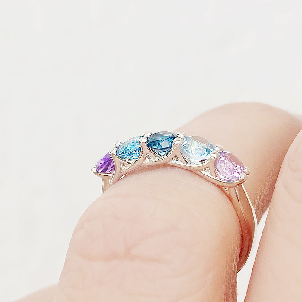 Danelle, a Topaz and Amethyst Rainbow Half Eternity Trellis Ring