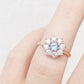 Fleur, a Lab Diamond and Topaz Flower Ring