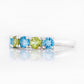 Round cut Swiss Topaz and Peridot half eternity ring - Victoria's Jewellery