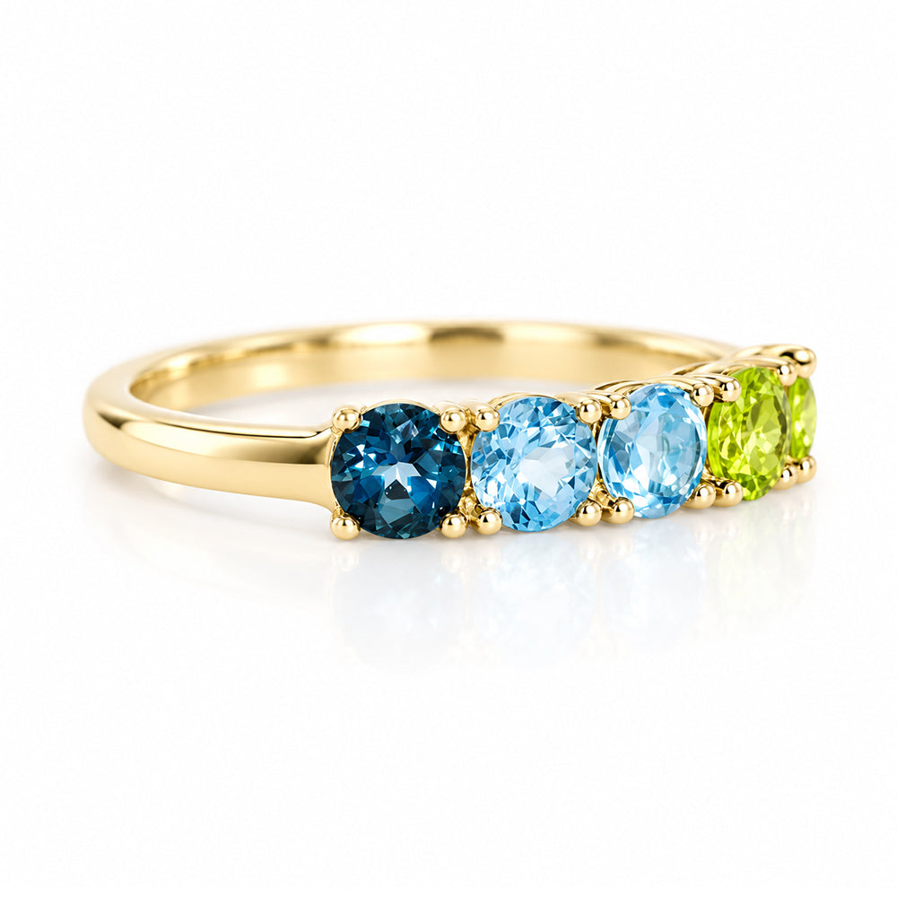 Annie, a Topaz and Peridot Half Eternity Ring - Victoria's Jewellery