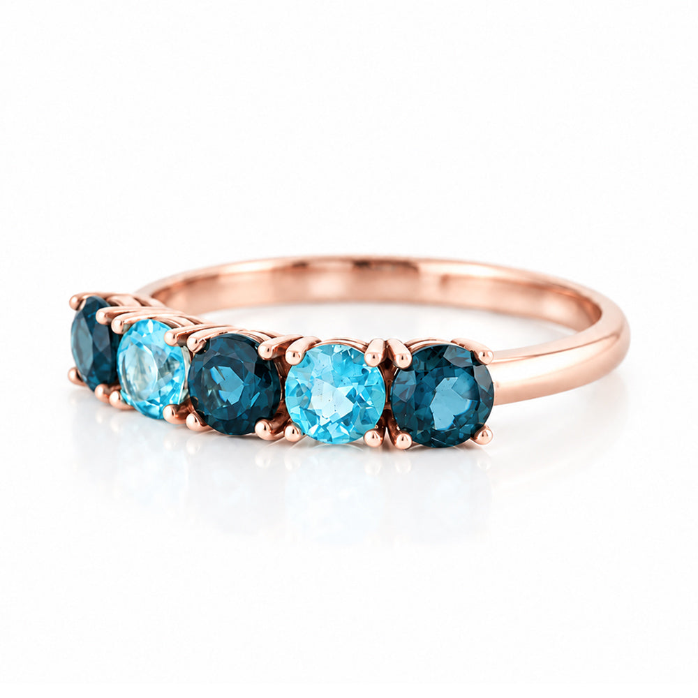 Annie, a London and Swiss Topaz Half Eternity Ring - Victoria's Jewellery