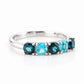 Annie, a London and Swiss Topaz Half Eternity Ring - Victoria's Jewellery