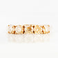 Round cut yellow moissanite half eternity ring in Yellow Gold - Victoria's Jewellery