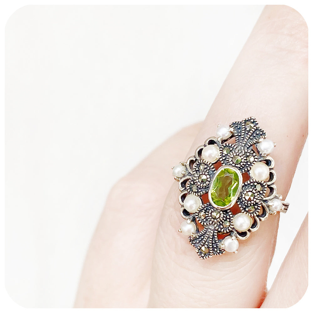 oval cut peridot and fresh water pearl vintage inspired ring
