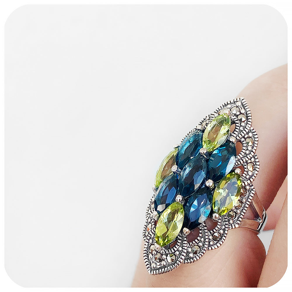 vintage marquise cut peridot and london blue topaz cluster ring