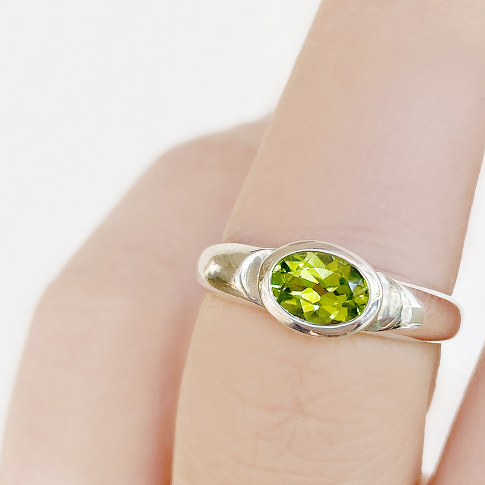 Oval cut Peridot signet style ring in silver - Victoria's Jewellery