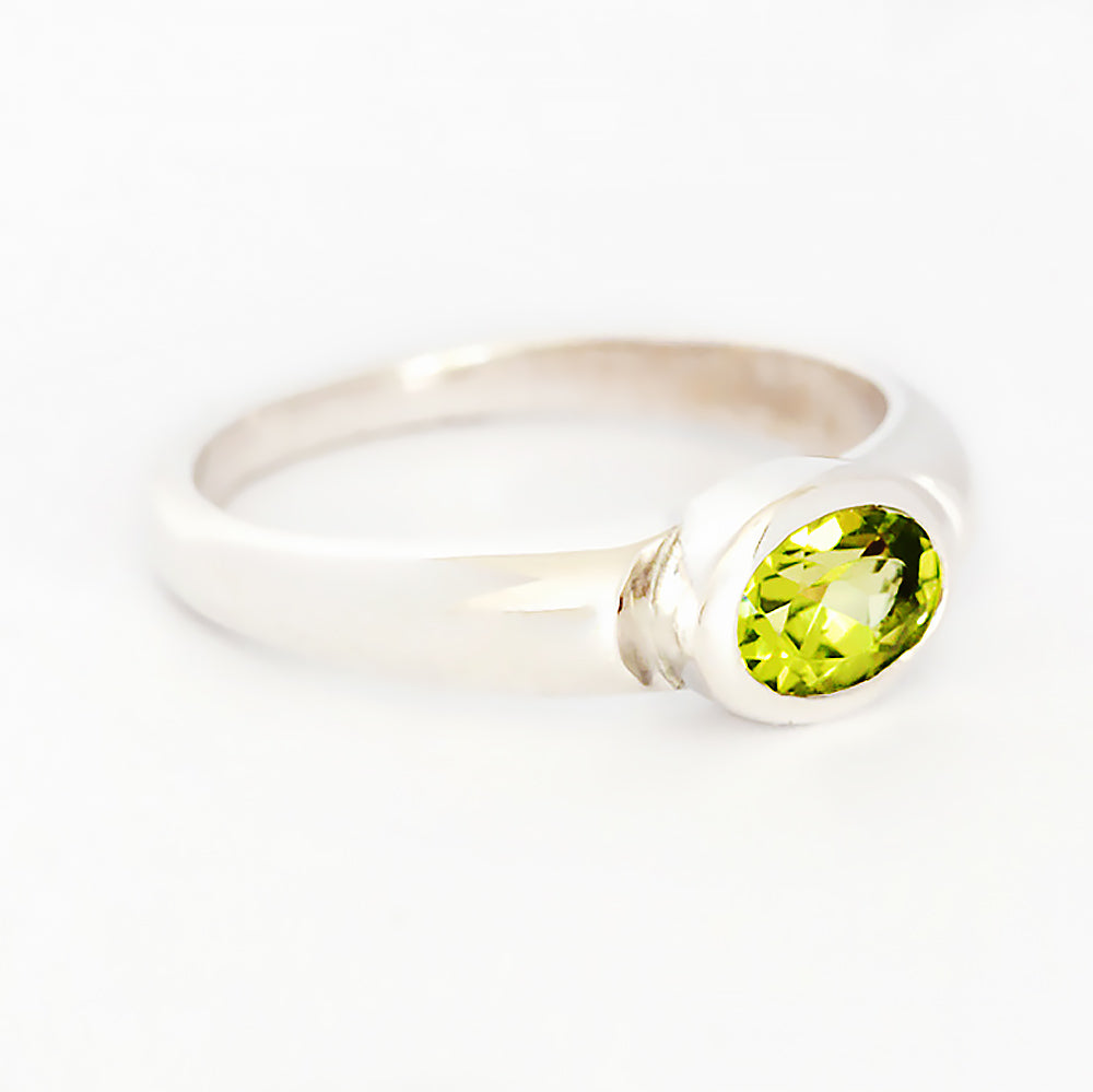 Oval cut Peridot signet style ring in silver - Victoria's Jewellery