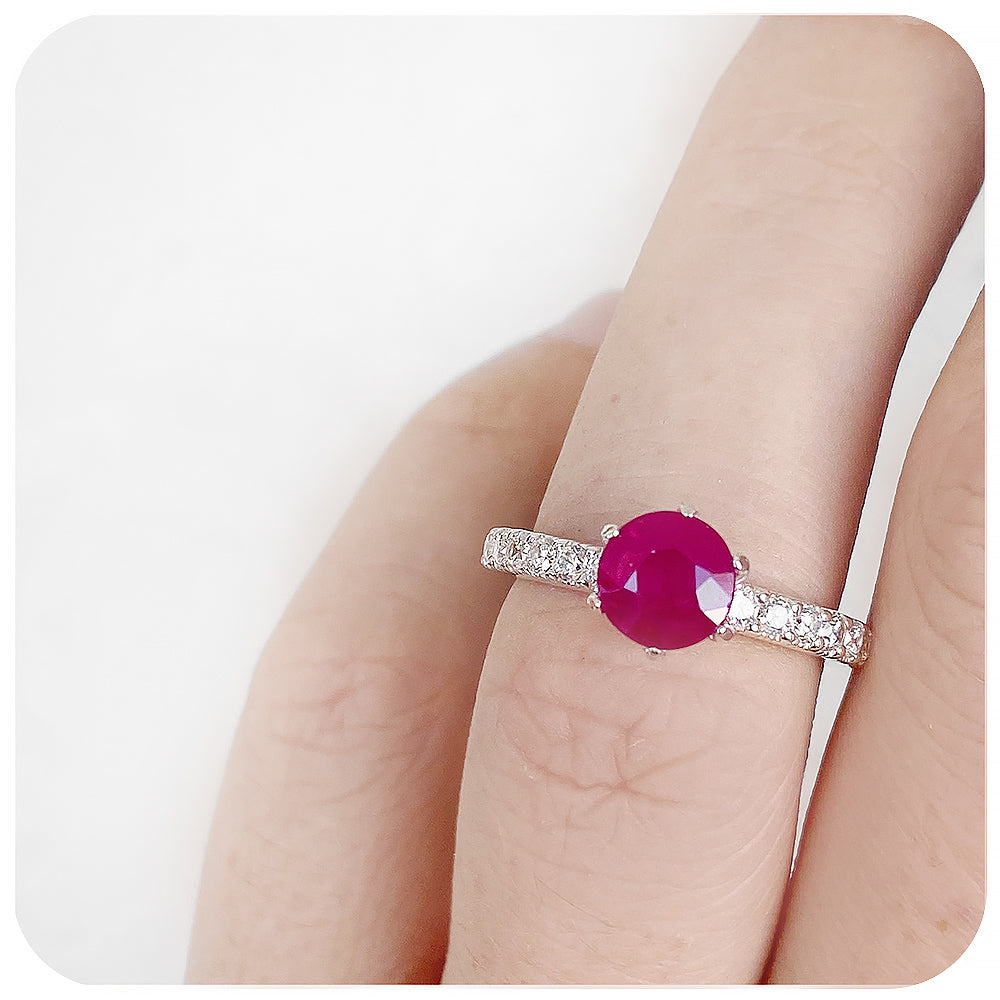 brilliant cut ruby and cubic accent engagement ring