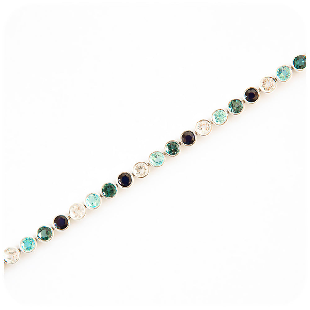 The Sapphire and Topaz Tennis Bracelet in Sterling Silver