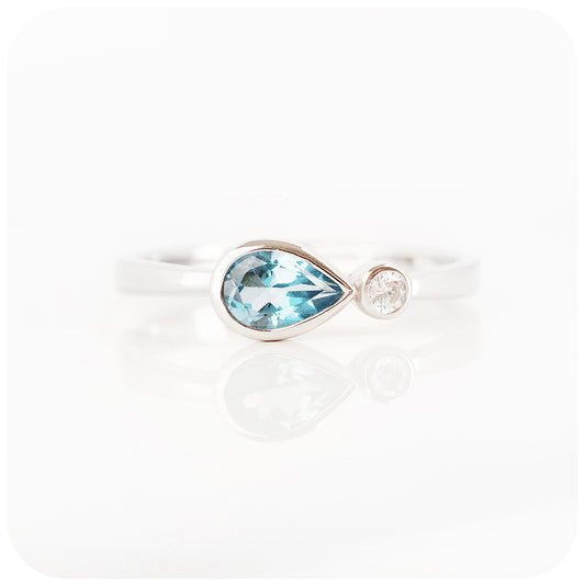 pear cut sky blue topaz and cubic zirconia stack ring in silver