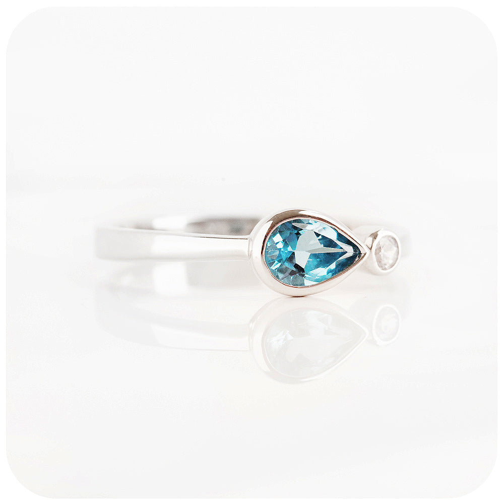 pear cut sky blue topaz and cubic zirconia stack ring in silver