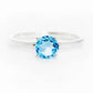 Lina, a Round cut Swiss Blue Topaz Solitaire Ring - Victoria's Jewellery