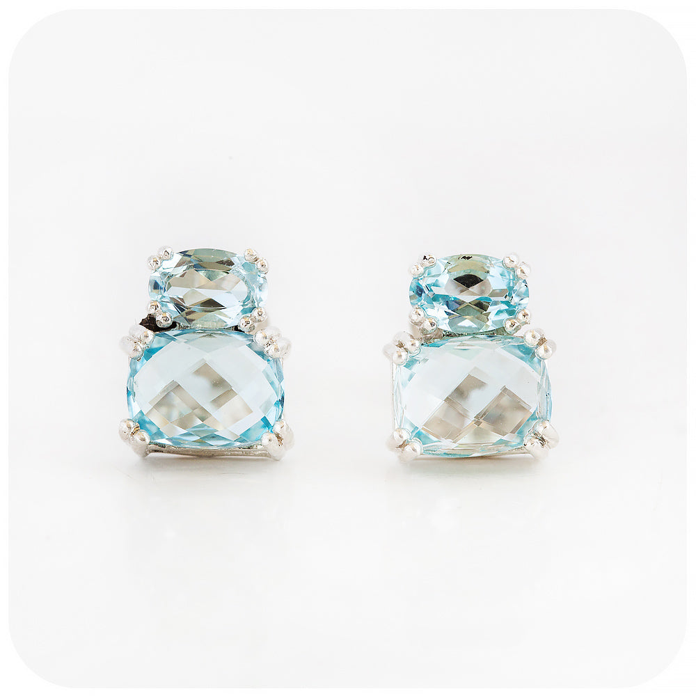 sky blue topaz stud earrings in sterling silver