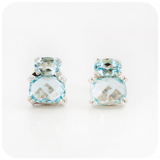 sky blue topaz stud earrings in sterling silver