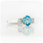 Serena, a Swiss and Sky Blue Topaz Trilogy Ring