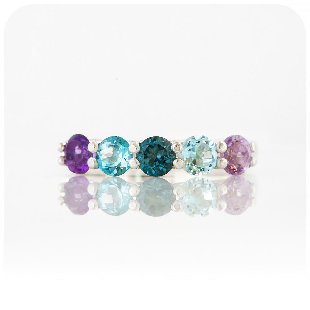 Danelle, a Topaz and Amethyst Rainbow Half Eternity Trellis Ring