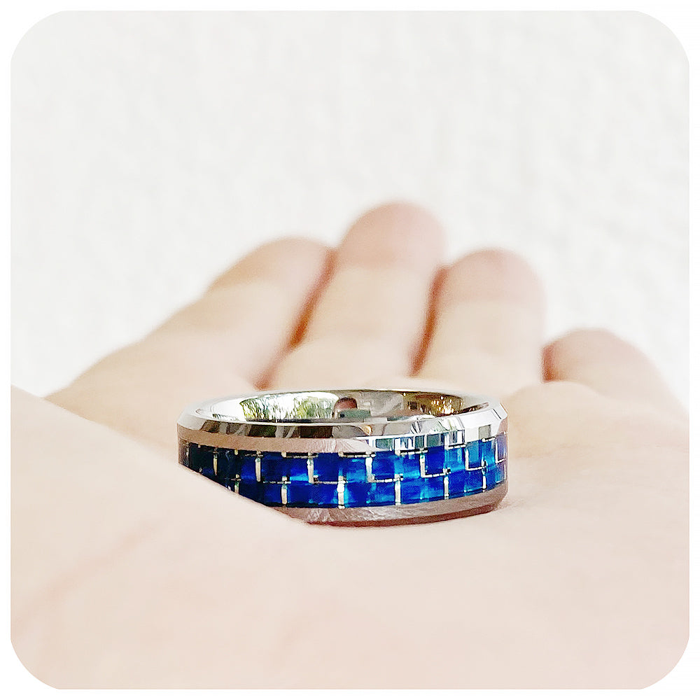 Jaxson, a Polished Tungsten Men's Ring with Dark Blue Carbon Fiber Inlay - 8mm