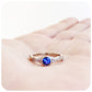 tanzanite and moissanite infinity style wedding ring
