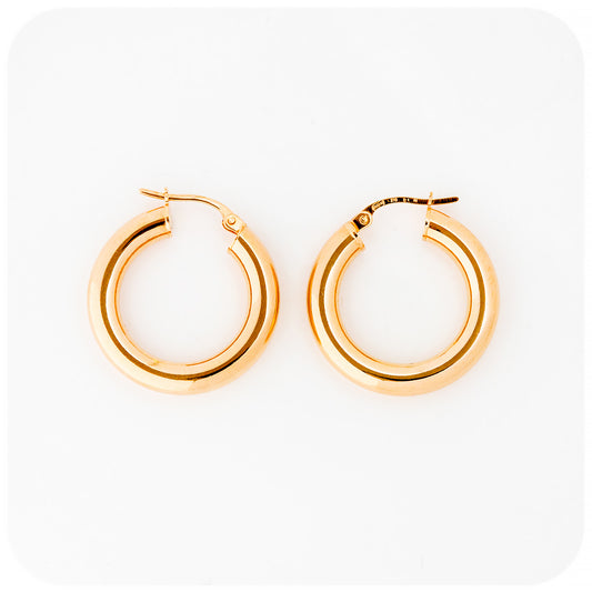 yellow gold rounded hoop earrings
